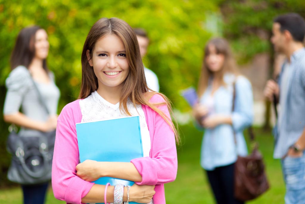 student with books in hand 1